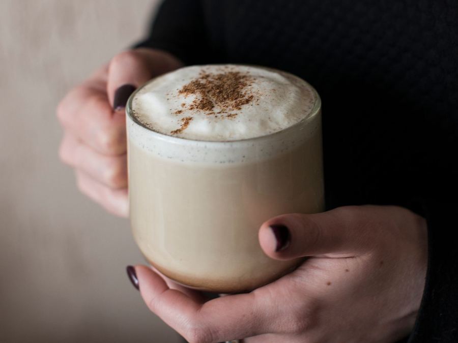 A creamy cappuccino dusted with cinnamon