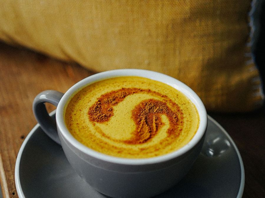 A warm turmeric latte with frothed milk